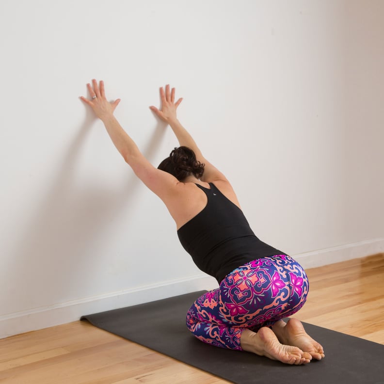 Child's Pose Against the Wall