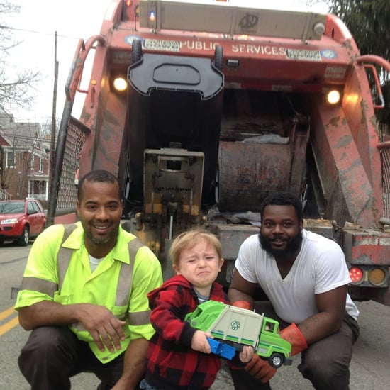 Little Boy Takes Photo With Garbagemen