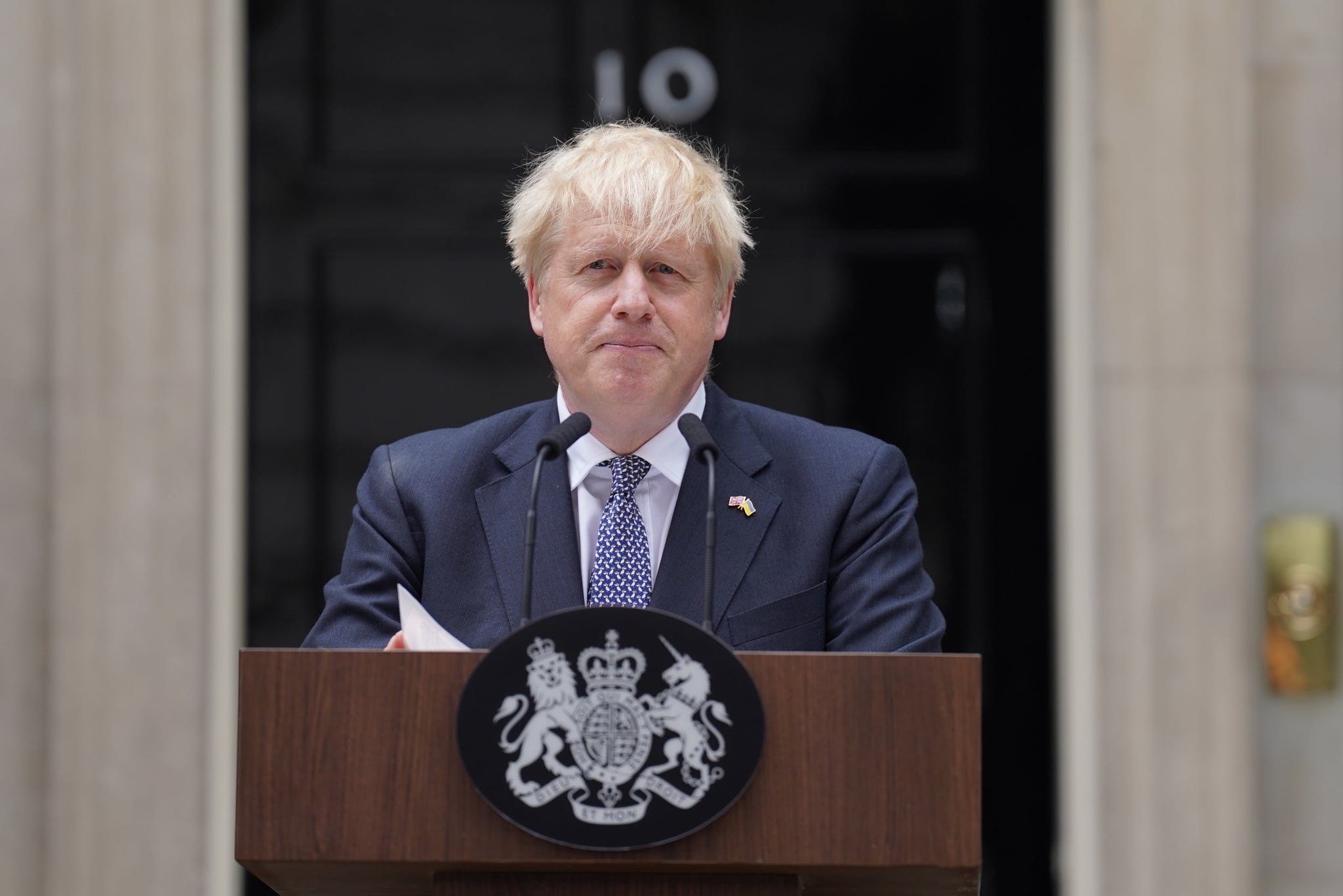 Prime Minister Boris Johnson reads a statement outside 10 Downing Street, London, formally resigning as Conservative Party leader after ministers and MPs made clear his position was untenable. He will remain as Prime Minister until a successor is in place. Picture date: Thursday July 7, 2022. (Photo by Stefan Rousseau/PA Images via Getty Images)
