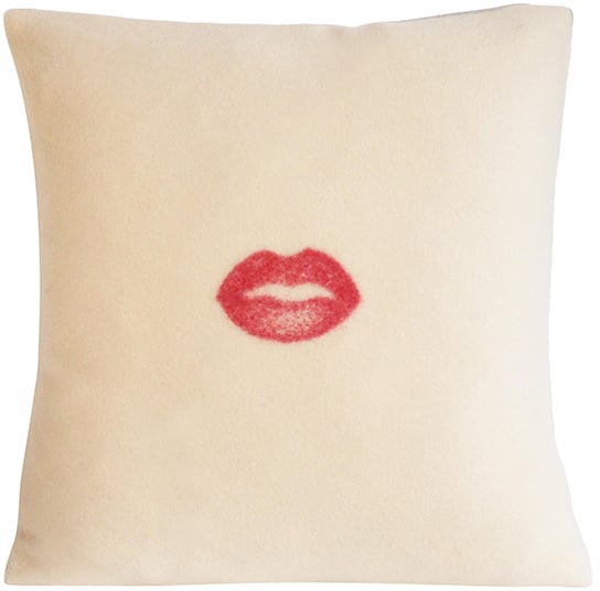 Toss this cheeky throw pillow ($80) on your sofa or loveseat and you're sure to turn a few heads. When your guests are done gawking at it, they'll enjoy resting against the soft wool and cashmere blend.

— MW