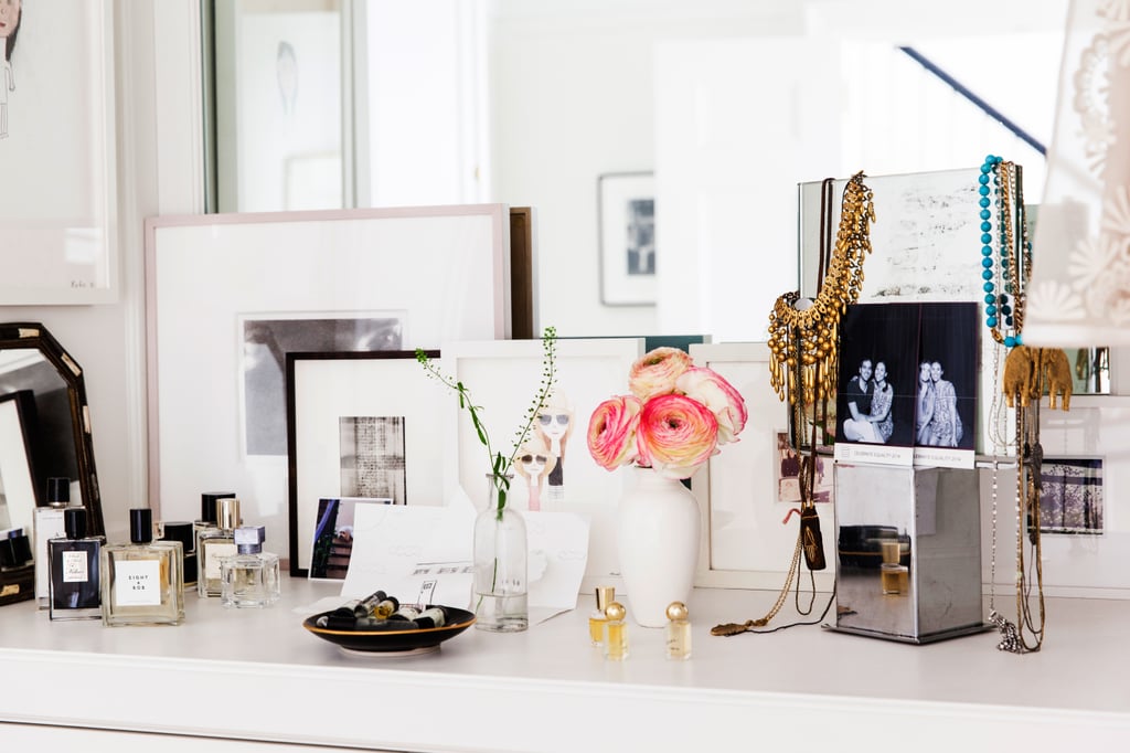 The vanity is as curated as the rest of the house, with photographs