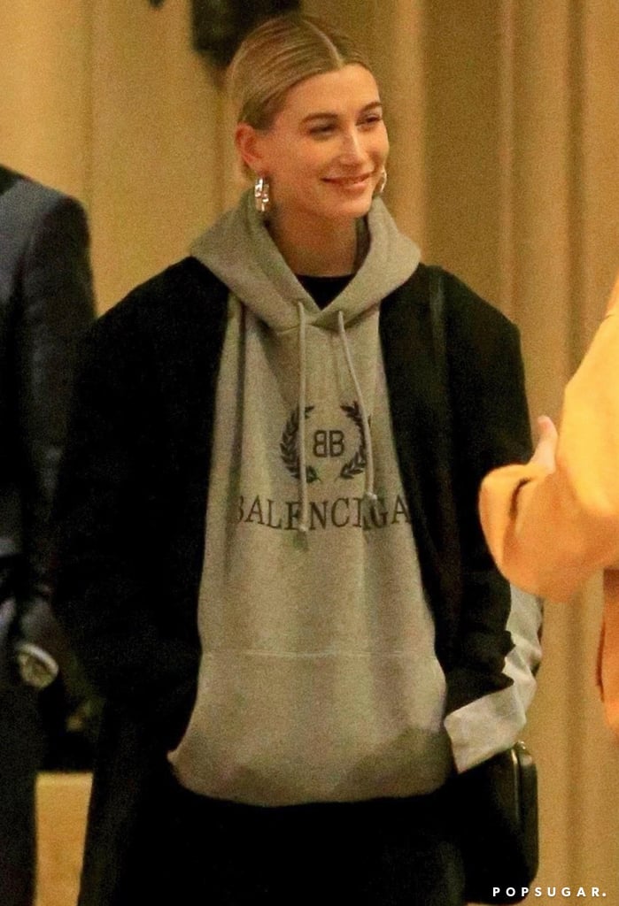 hailey baldwin bieber wearing a gucci sweatshirt as she leaves