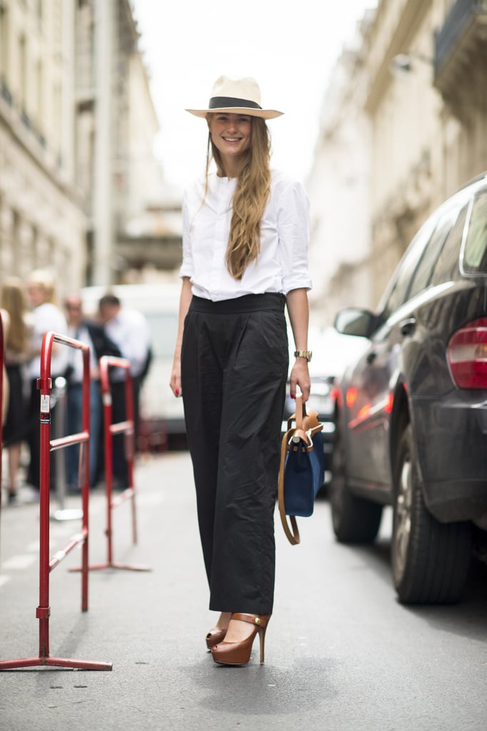 Wide-leg trousers are undeniably feminine when styled with a spiky-heeled shoe.
Source: Le 21ème | Adam Katz Sinding