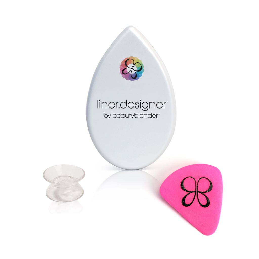 Musicians may notice that this tool looks similar to a guitar pick, but it's actually asymmetrical and made of a highly flexible silicone that can bend to the shape of your eye. One side is superstraight, one side is short and rounded, and the last side is very slightly curved, allowing you to create a wide range of liner looks, whether you're wielding a pencil, gel, or liquid formula.