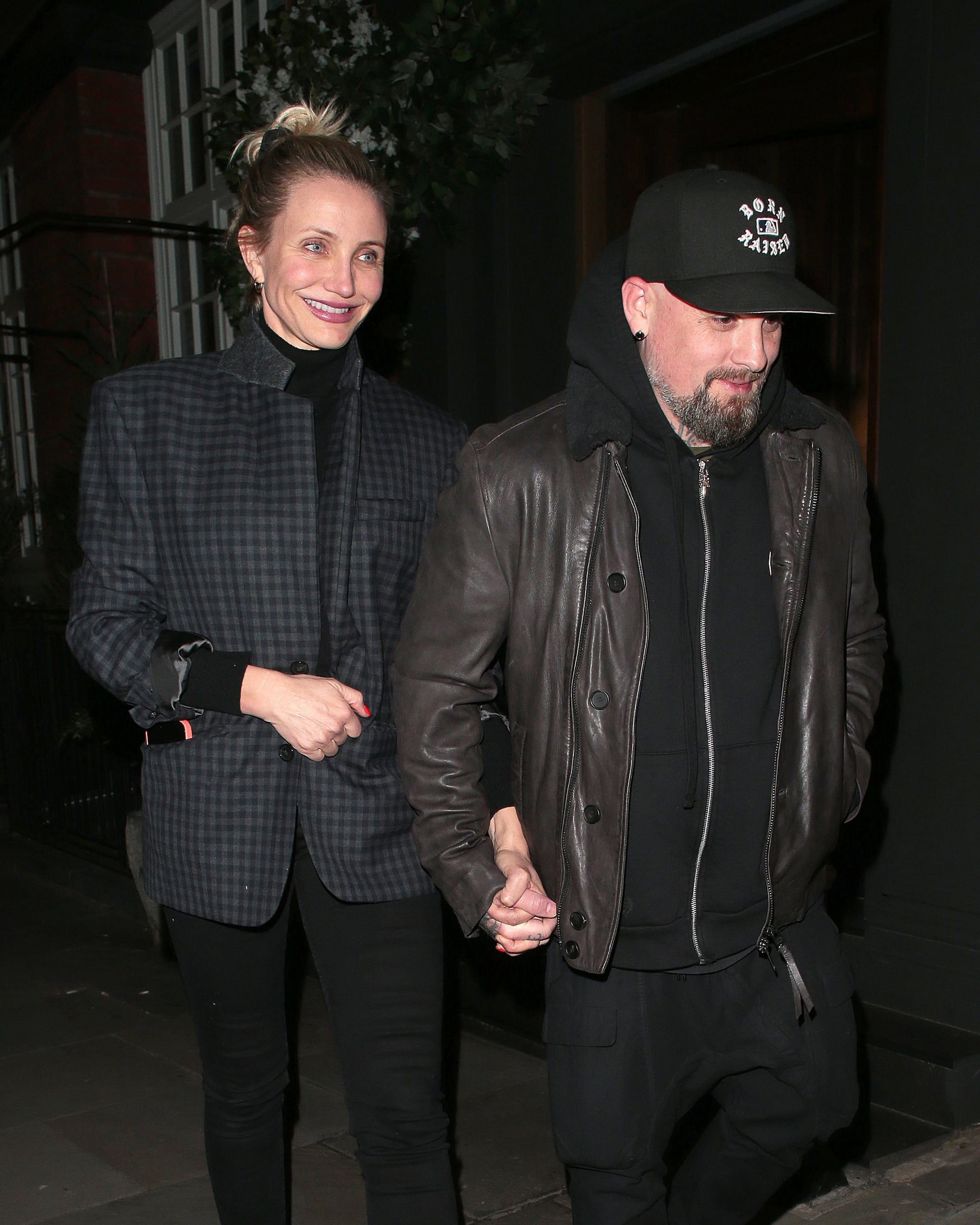 LONDON, ENGLAND - DECEMBER 02:   Cameron Diaz and Benji Madden seen on a night out at Sparrow Italia - Mayfair restaurant on December 02, 2022 in London, England. (Photo by Ricky Vigil M/GC Images