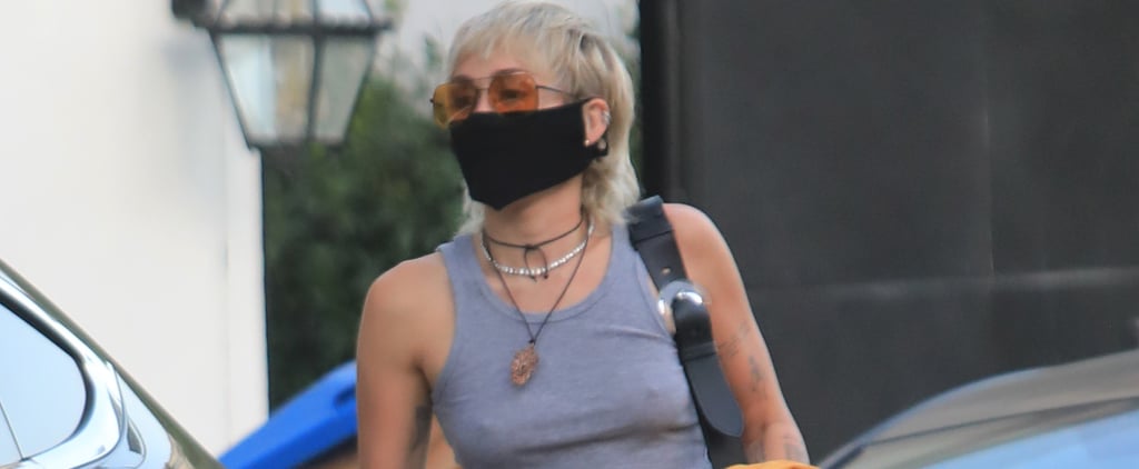 Miley Cyrus Wears a Gray Tank Top and Trousers
