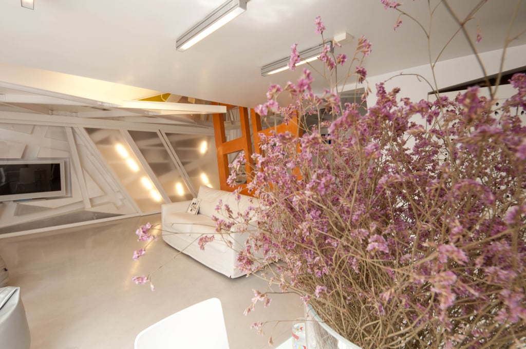 The one-bedroom, two-bathroom apartment can't actually fly into space, but it can propel you into the heart of Rome; it's located right on the famous Piazza Navona.