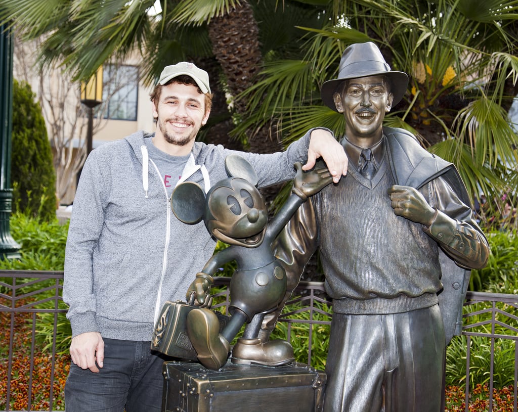 James Franco got up close and personal with a statue of Walt Disney at the LA park in March 2013.