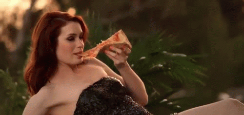 She knows that pizza is an excellent tool for seduction.