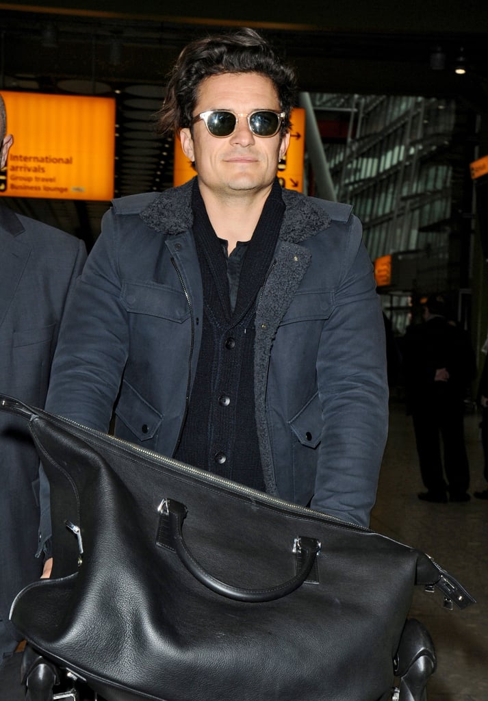 Orlando Bloom touched down in London's Heathrow Airport on Tuesday.