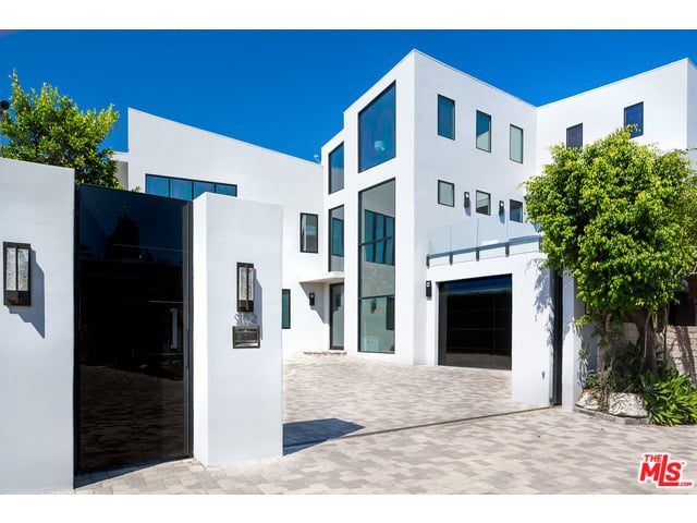 What's a Beverly Hills home without gated entry and a lengthy driveway?