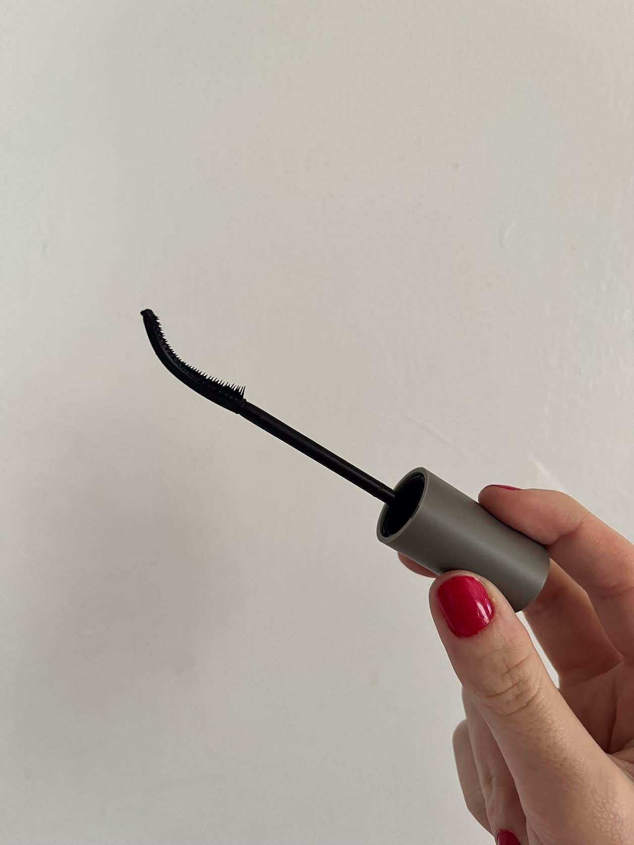 The Refy Lash Sculpt Mascara has a curved wand and plastic bristles