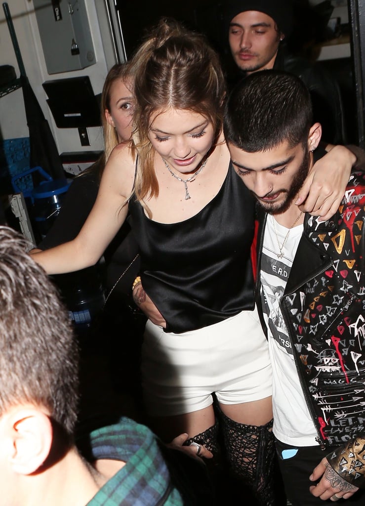 Gigi Hadid celebrated her 21st birthday with a star-studded party at The Nice Guy in LA on Thursday night, and after living it up with pals Taylor Swift, Kendall Jenner, Lily Aldridge, and Hailey Baldwin, the model was spotted being helped out of the club by her boyfriend, Zayn Malik. If you know anything about turning 21, Gigi's good time should look pretty expected; before her Hollywood bash, she rang in the big day with a low-key family lunch last Saturday and shared photos of herself hanging out with her parents and siblings. Keep reading to see Gigi leaving her party, then take another look at her supersteamy Vogue shoot with Zayn.