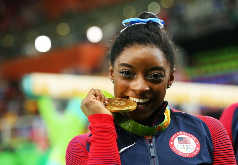 When she bit on her gold medal like a champ