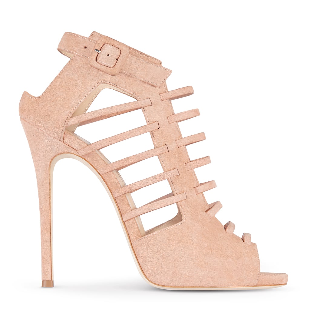The Jen bootie ($1,250) is a cage heel you'll want in both tan and navy blue suede.