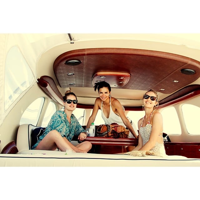 Doutzen Kroes relaxed on a boat with Adriana Lima and Candice Swanepoel.
Source: Instagram user doutzen