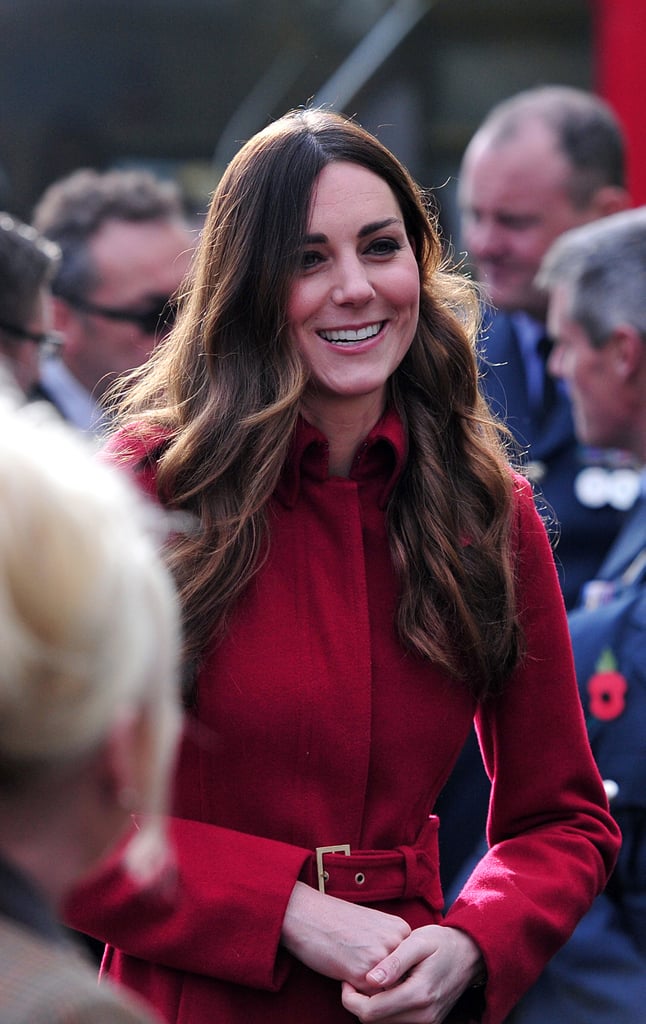 By now, you've probably noticed Kate has a signature look, but she changed it up a bit with a middle part back at the Poppy Day celebration.