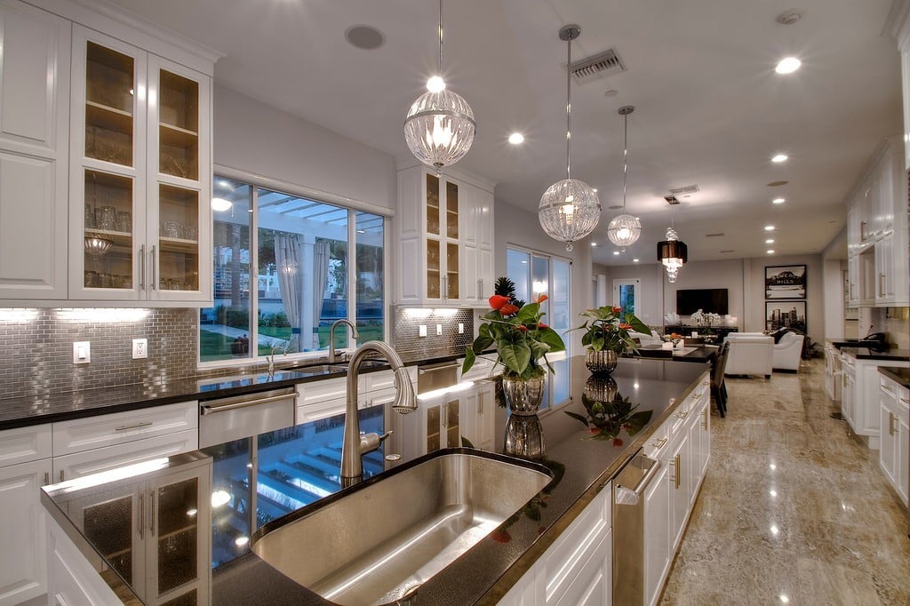 With its granite counters, custom cabinetry, and Viking appliances, the gourmet chef's kitchen is the perfect place to prepare big prefight meals.