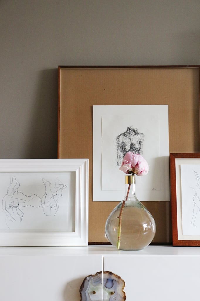 Victoria saved on art by making all the pieces herself. "Before I entered the world of interior design, I studied art — specifically figure drawing — so all the pieces in the space are my own."