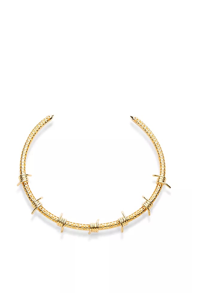 The '90s kid in me had a moderate freak-out when I learned that choker necklaces are on the rise again. While I'm happy to designate the stretchy tattoo style as #TBT only, this Fallon barbed-wire collar necklace ($440) is the perfect way to wear the trend in 2015.
— AM