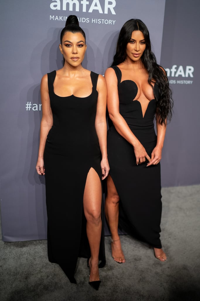 Kim Kardashian and Kourtney Kardashian at the amfAR New York Gala in 2019