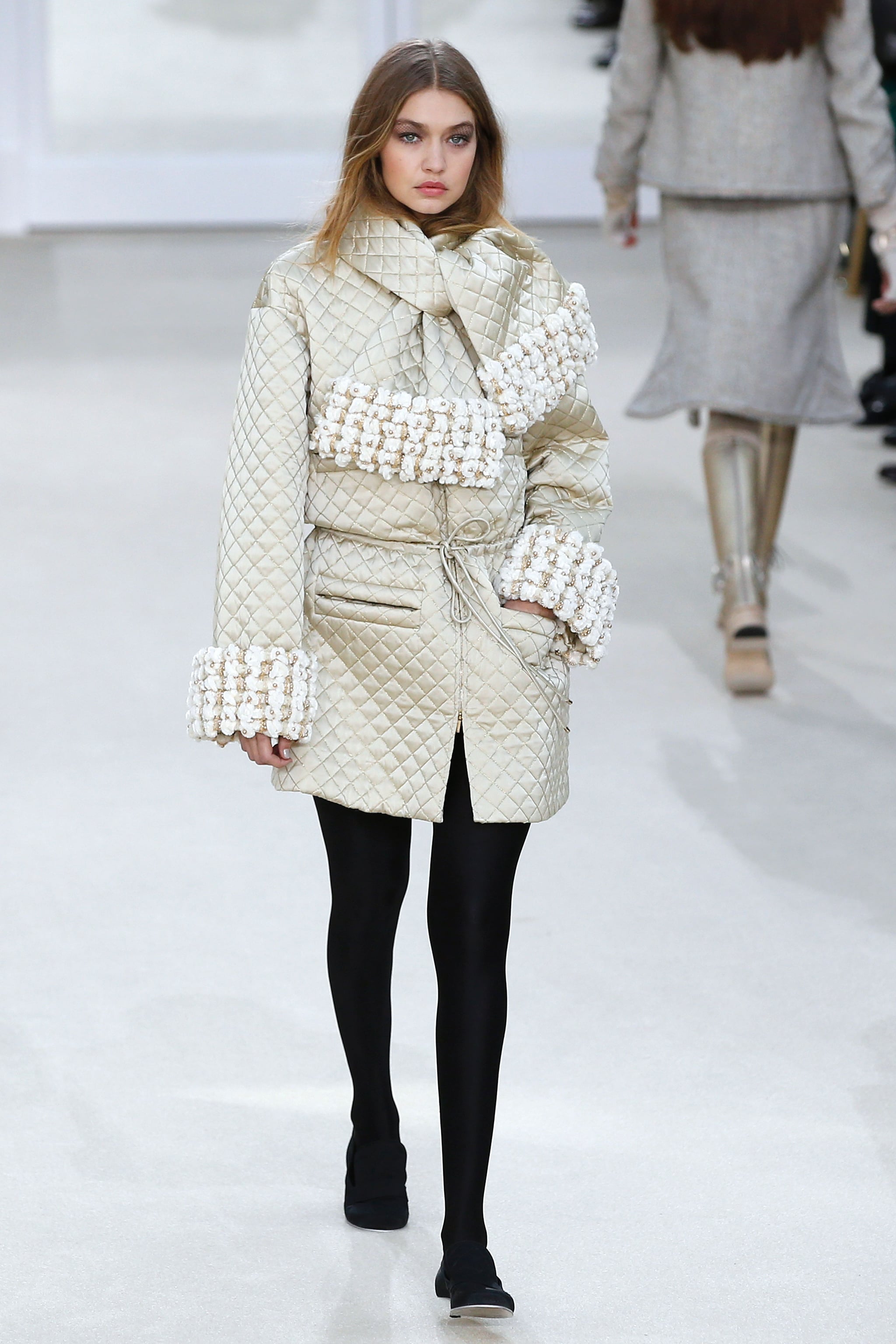 Gigi worked a quilted metallic puffer 