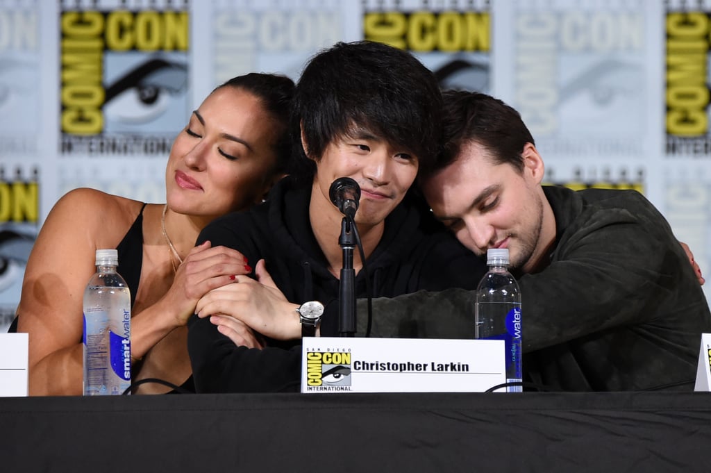 Pictured: Tasya Teles, Christopher Larkin, and Richard Harmon.