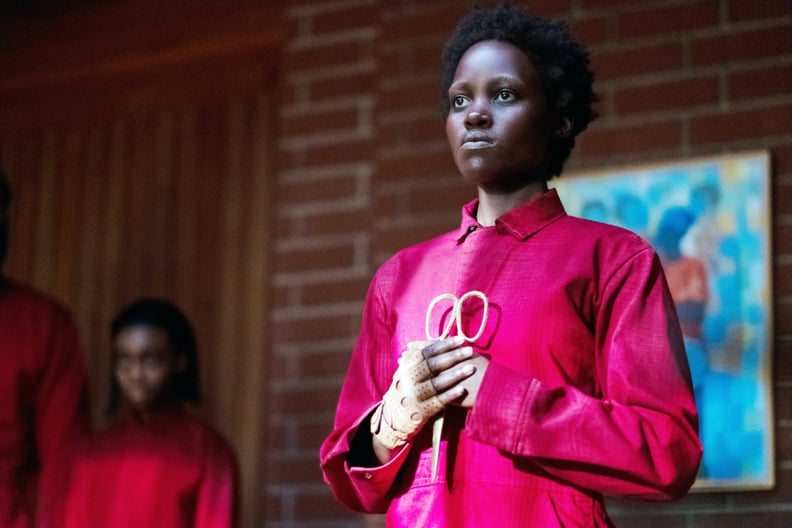 US, foreground: Lupita Nyong'o as doppelganger Red, 2019. ph: Claudette Barius /  Universal / courtesy Everett Collection