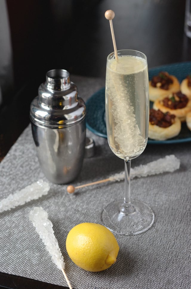 French 75 Mocktail With Rock Candy Stirrer