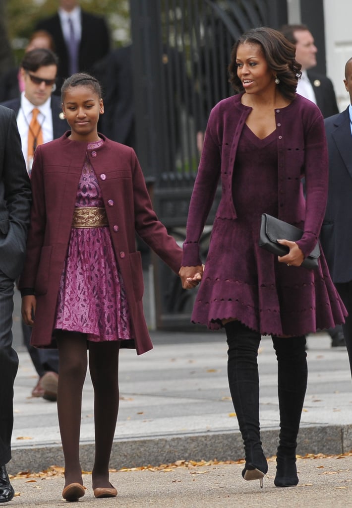 And a Collarless Maroon Piece With Flashy Buttons