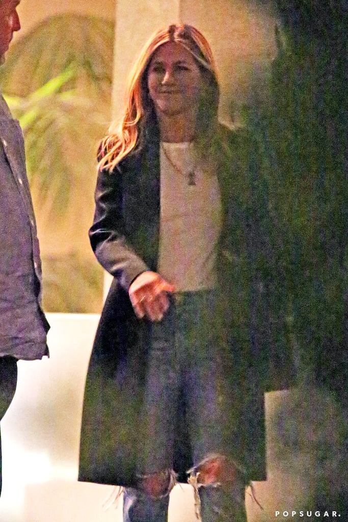Jennifer Aniston was all smiles when she was spotted leaving BFF Courteney Cox's home in Beverly Hills on Tuesday night. Jennifer kept things casual in ripped jeans and a black coat, but noticeably missing from her left hand was her wedding ring. 
Jennifer and Justin Theroux announced that they're separating after two years of marriage in February, saying that their decision to split "was mutual and lovingly made at the end of last year." The same day that Jennifer's rep released the couple's breakup statement, the actress was photographed arriving at a film studio in LA. Jennifer has reportedly been leaning on her friends for support, while Justin, on the other hand, has stayed out of the spotlight for the most part. Over the weekend, Justin broke his silence on Instagram to document his recent visit to the Austin Pets Alive! shelter in Texas. 

    Related:

            
            
                                    
                            

            What Went Wrong? Everything We Know So Far About Jennifer Aniston and Justin Theroux&apos;s Split