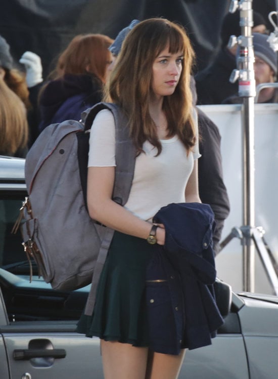 Johnson rocked Ana's schoolgirl look, complete with the short skirt and backpack.