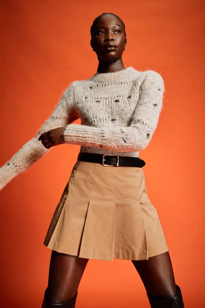 Long pleated orange sales skirt