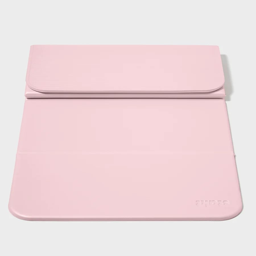 Stakt Yoga Mat ($94)
If you're on the hunt for a durable yoga mat that's equally easy to store, this foldable mat from Stakt is a wishlist topper. Use as is or fold into quadrants for extra joint support during exercises at home or at the gym. And while it shouldn't matter, it's also worth noting that they come in seven very cute different color options. For more details, including how it stacks up to the Stakt Mat Pro, read our review of the Stakt mat.
Editor Quote: "Sometimes I need to quickly provide additional support for the knee joint, particularly for exercises starting from a half-kneeling or tall-kneeling position or unilateral movements that focus on one leg at a time, such as the rear-foot elevated split squat. Usually, I'll grab an Airex pad, but the Stakt Mat eliminates the need to reach for something else. You can simply fold one or more segments over to create the perfect amount of cushion; it's so easy to use. And once folded, the layers don't slide around on each other or the floor." — Jade Esmeralda, former staff writer