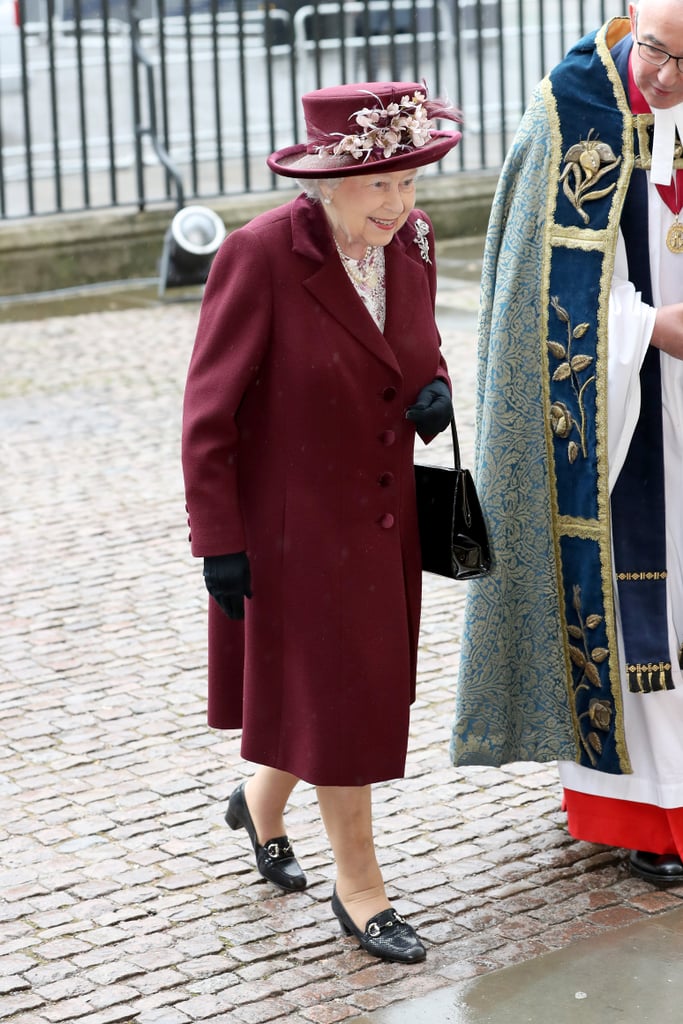 For the Commonwealth Day service at Westminster Abbey, which was also attended by Meghan Markle, the monarch wore her loafers with a burgundy coat and matching hat.