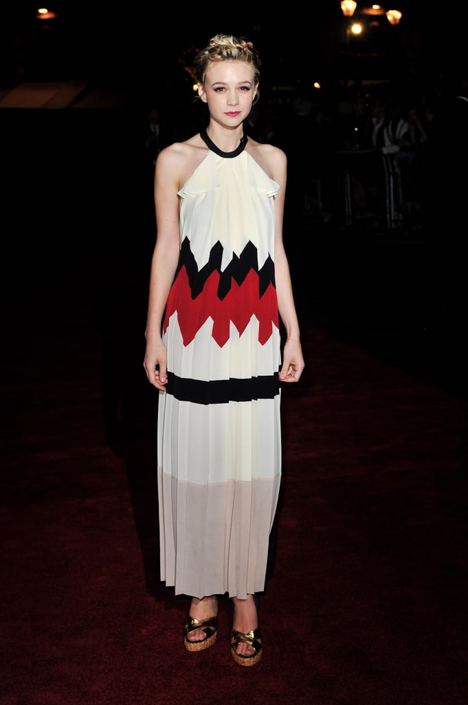 What's not to love about the gorgeous Vionnet maxi Carey chose for opening night of the London Film Festival? From its full-bodied hues to its feminine pleating and ruffle detail, this halter is absolute perfection — and let's not forget her shimmering Giuseppe Zanotti for Vionnet wedges.
What's not to love about the gorgeous Vionnet maxi Carey chose for opening night of the London Film Festival? From its full-bodied hues to its feminine pleating and ruffle detail, this halter is absolute perfection — and let's not forget her shimmering Giuseppe Zanotti for Vionnet wedges.
