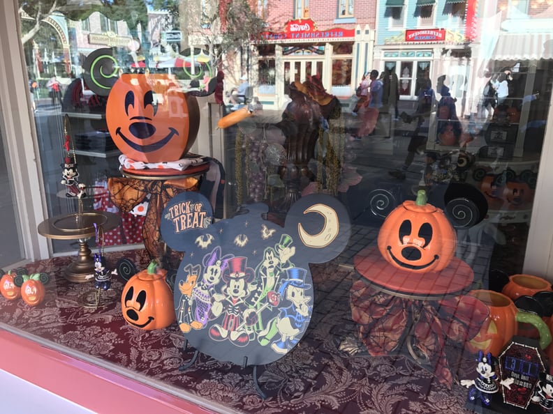 Store window displays feature Halloween gear.