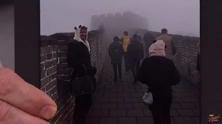 Liam carried Jennifer Lawrence's purse while visiting The Great Wall of China. That's the sign of a good guy!