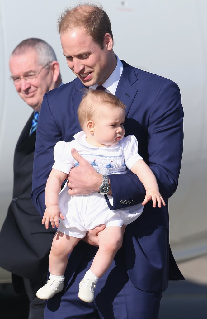 He skillfully held on to George as they arrived at an airport in 2014.