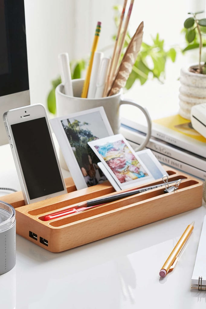 Keep your gadgets organized and charged in the Wood Charging Station ($50). It has two USB ports, so you can charge more than one device, and has other slots to store anything else you need.