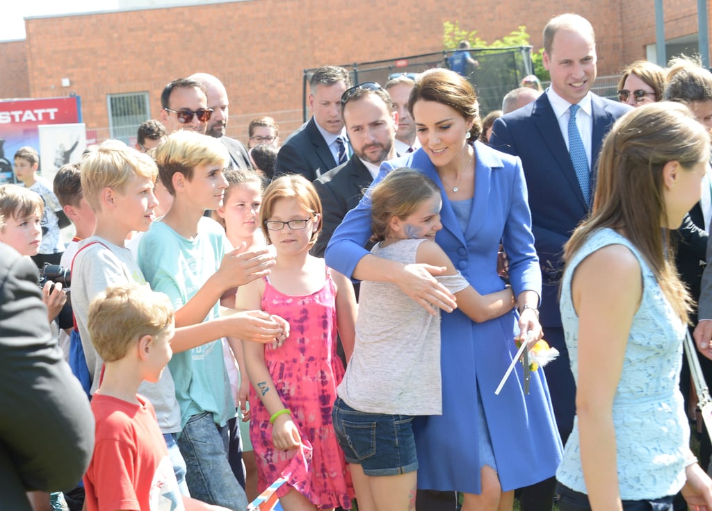 Greeting Kids With Warm Hugs