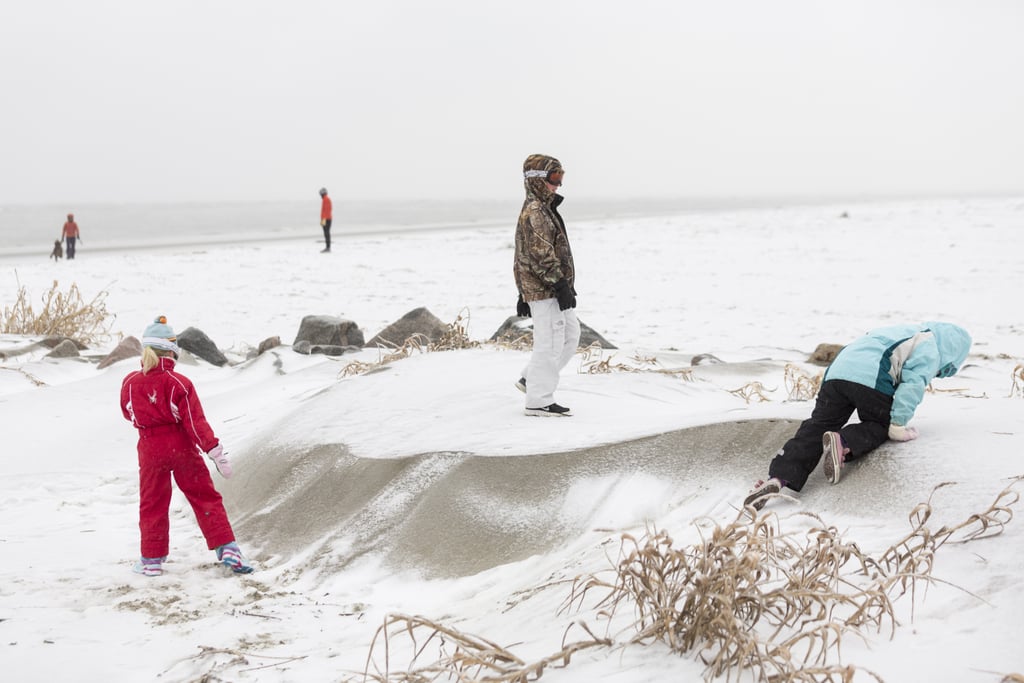 Snow made its way to Charleston, SC, where kids played on snow-covered sand dunes at the beach.