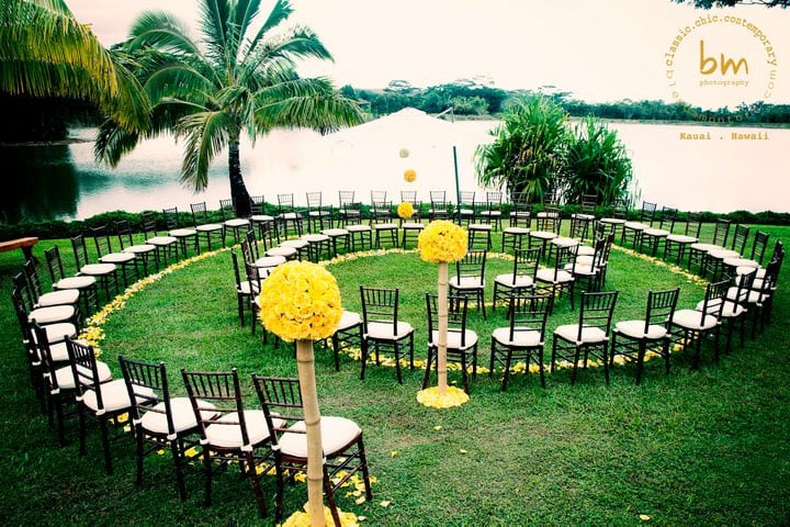 1. Circular Ceremony Seating
Often, there is so much emphasis on where to seat guests at the reception that ceremony seating can get overlooked. Although standard seating may be the only feasible option at a church or temple, non-religious venues and outdoor receptions offer more flexibility. I especially love circular ceremony seating (also know as a ceremony in the round) because it creates a warmer and more intimate setting. Unlike a traditional ceremony format, where the bride and groom have their backs turned, circular seating provides a better visual aspect for everyone involved. One important factor to keep in mind is that the wedding processional should circle around the wedding canopy so that all of the guests can see the bridal party as they make their entrance.