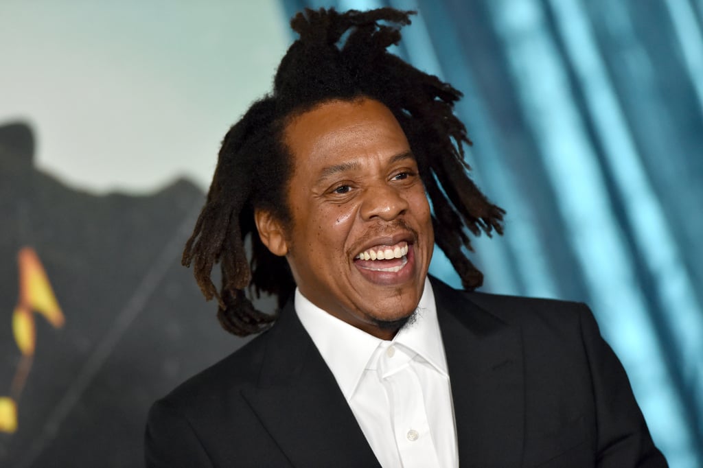 JAY-Z was front and center at the star-studded screening of his upcoming film The Harder They Fall in Los Angeles on Oct. 13. The premiere brought out a bunch of famous faces — including Winnie Harlow, Karrueche Tran, Kehlani, and, of course, his wife, Beyoncé — but he clearly had no idea Kelly Rowland would be in attendance, because he had the cutest reaction when he spotted her on the red carpet. Netflix's official Twitter account shared a clip of the sweet moment, showing JAY-Z's genuine surprise at seeing his friend. "I didn't even know you were here," he told Kelly as he gave her a big hug.
In a recent Instagram Live, Kelly reacted to the now-viral moment, saying she didn't understand why it was such a big deal since she and JAY-Z see each other all the time. "Some things I will never understand," Kelly said. "I see my big bro all the time, but I guess you guys never see what we see? I don't know."
The Harder They Fall is a Black Western starring Idris Elba, Jonathan Majors, Zazie Beetz, Delroy Lindo, LaKeith Stanfield, Danielle Deadwyler, Edi Gathegi, R.J. Cyler, Damon Wayans Jr., Deon Cole, and Regina King. JAY-Z is a coproducer along with James Lassiter, Lawrence Bender, and G. Mac Brown. While speaking with Entertainment Tonight, JAY-Z said he hopes the film shows viewers the importance of representation. "I love to be apart of projects that widen the lens," JAY-Z said. "Once it's widened for us, it's widened for Asians. For Mexicans. For everyone." Ahead, see more of JAY-Z and Kelly's reunion at The Harder They Fall's screening, and make sure to stream it on Netflix when it debuts on Nov. 3.