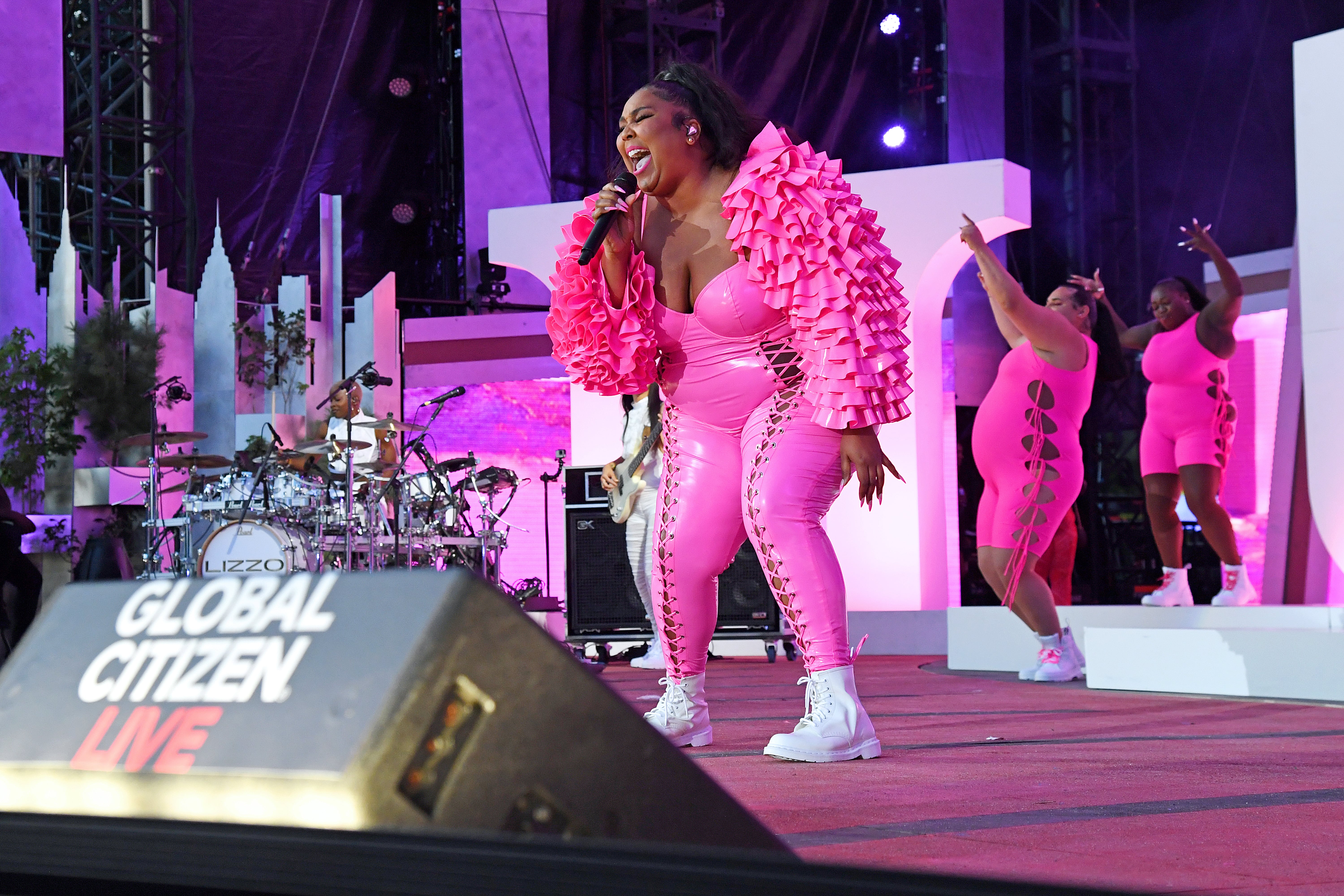 Lizzo wears pink LA Roxx jumpsuit to Global Citizens concert
