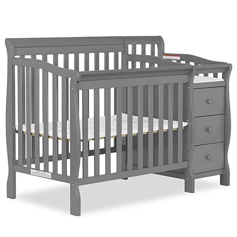 Mini crib with drawers underneath top