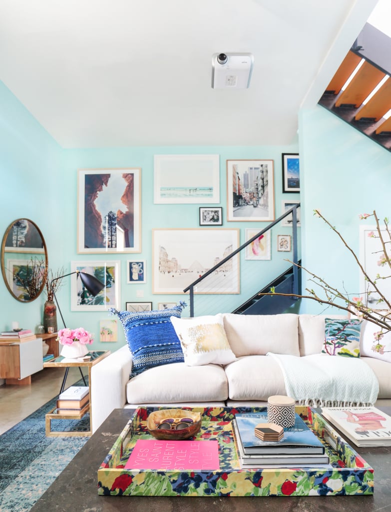 Whitney and Tim's Venice Beach home is a work/live artist's loft complete with soaring ceilings, poured concrete floors, and stylized wire railings. "It has an industrial feel," explains Whitney, who wanted Orlando to help her warm the space up.