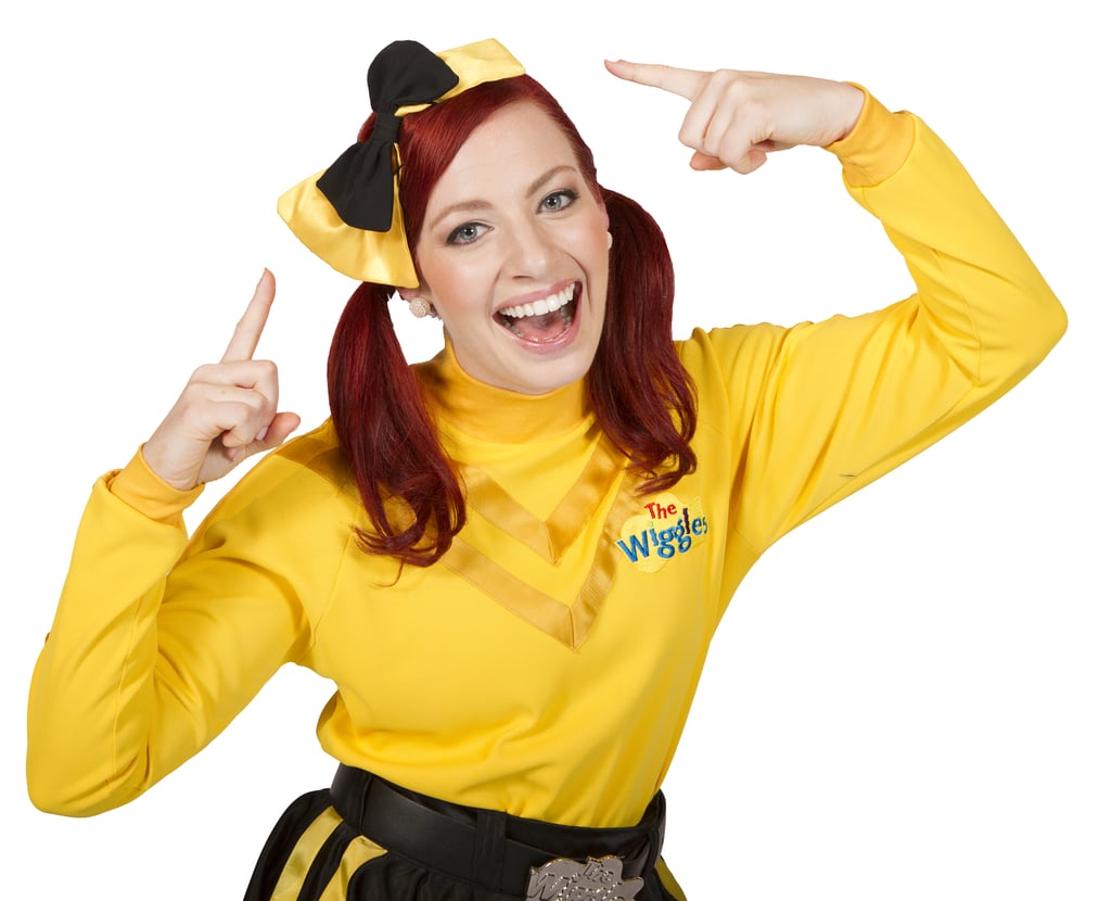 POPSUGAR: Congratulations on not only joining The Wiggles, but also being the first female in the group. How does it feel holding that title in what’s always been an all-male group?
Emma Watkins: It's quite exciting. I actually watched The Wiggles when I was growing up — I idolized them, and I don’t think I ever thought that I would be one, particularly being a girl. This is probably the most exciting thing that's ever happened to me
PS: Being the only female puts you in a position to be a role model for young girls. How does that feel?
EW: It's really hit me this year. A lot of the children — girls and boys — are coming to the shows wearing big yellow bows, because I wear this big yellow bow in my hair. I think that reflects, to me, that the children are really getting into the new Wiggles. There are so many parents posting pictures of their children wearing the bows, and it's been a wonderful thing to see. 
PS: What's been the biggest challenge for you?
EW: The most challenging thing is just trying to balance the time. I think that's the best part about being the youngest, too. It's been the most diverse part of my life, and I've been able to travel and meet children all around the world, which I probably wouldn't have been able to do in any other job.
Source: The Wiggles