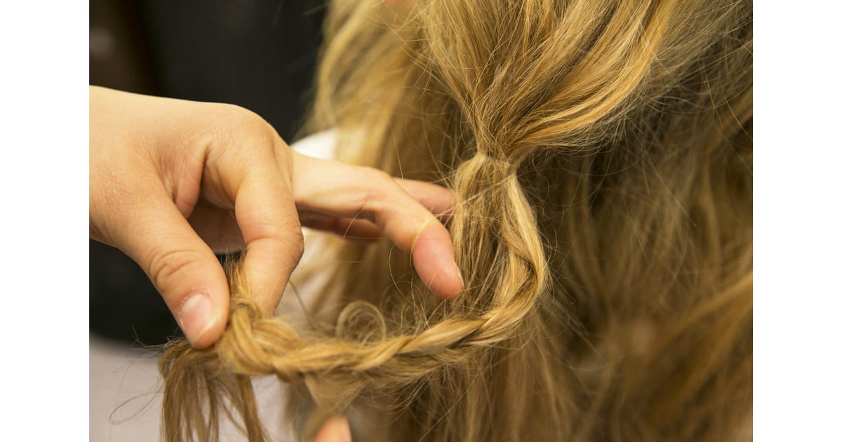 To hide the elastic, take a small section of hair from the ponytail