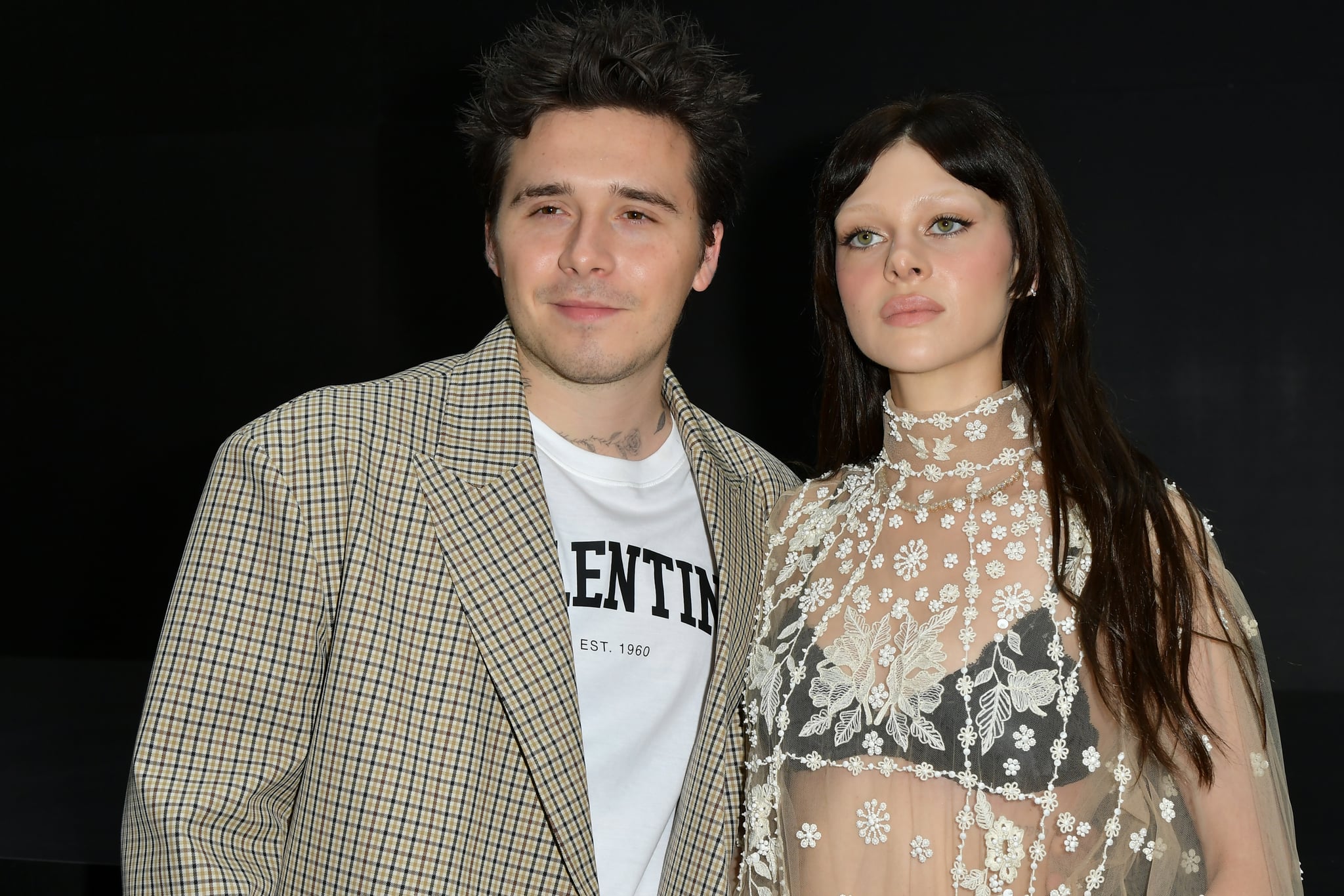 PARIS, FRANCE - OCTOBER 02: (EDITORIAL USE ONLY - For Non-Editorial use please seek approval from Fashion House) Brooklyn Beckham and Nicola Peltz Beckham attend the Valentino Womenswear Spring/Summer 2023 show as part of Paris Fashion Week  on October 02, 2022 in Paris, France. (Photo by Dominique Charriau/WireImage)